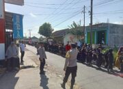 Sinergi TNI-Polri dan BKD Amankan Gerak Jalan HUT RI ke-80 di Desa Jelantik ‎