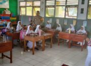 Bhabinkamtibmas Memonitor Pendistribusian Makan Bergizi Gratis (MBG) di Sekolah Dasar Kota Bima