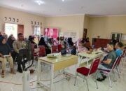 Bhabinkamtibmas Dampingi Kegiatan Sosialisasi PMT untuk Percepatan Penurunan Stunting