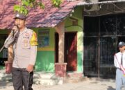 Police go to school, Bhabinkamtibmas Polsek Woha Jadi Irup Bendera di SMAN I Woha